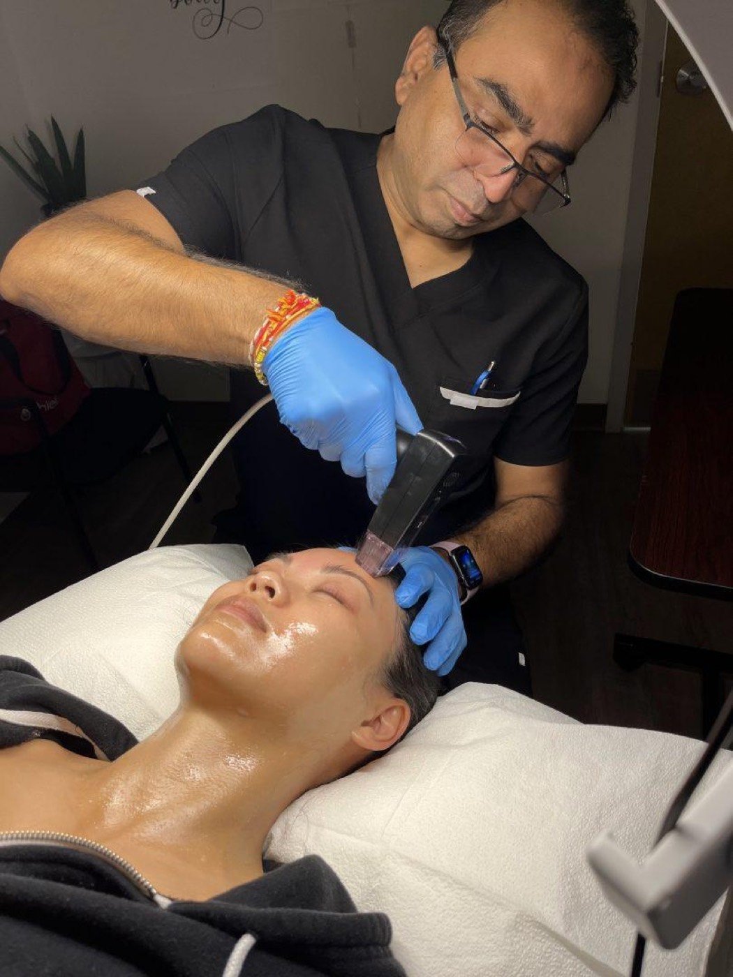 A hydrofacial treatment being performed